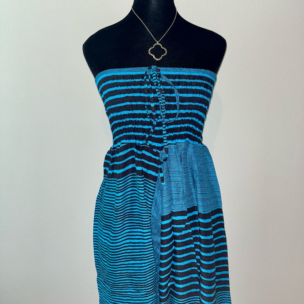 OurWellnessSerenity strapless romper/harem pants with blue and black stripes.